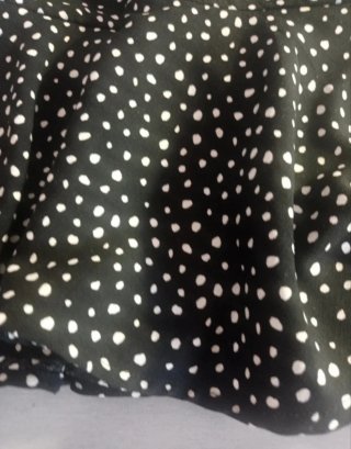 Falda corta lunares