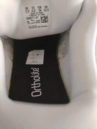 Zapatillas Puma niño beige/negras
