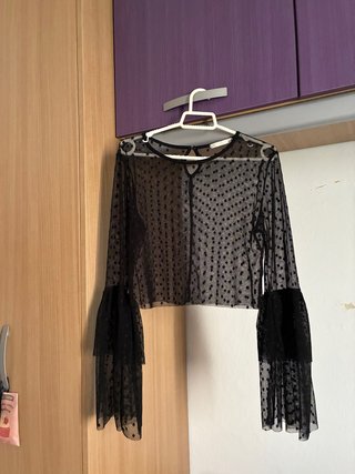 Top transparente volantes manga extra larga