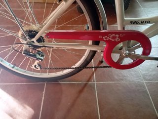 Bicicleta de paseo rosa y blanca