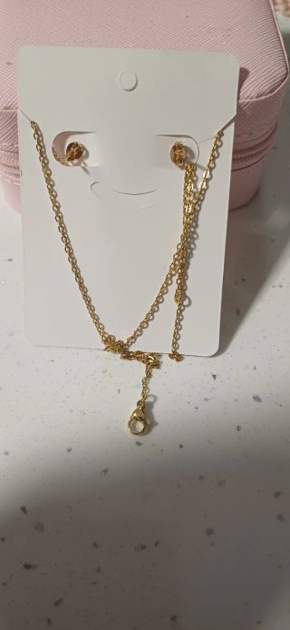 Conjunto collar y pendientes acero dorado