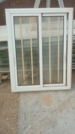 Ventana PVC Blanca con Rejas