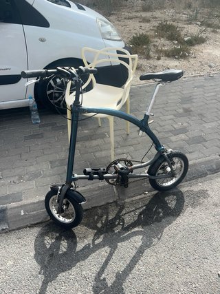 Bicicleta plegable azul marca OS SBY