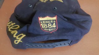 Gorra Breitling Azul y Dorada
