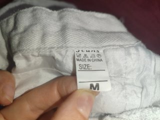 Shorts blancos rotos