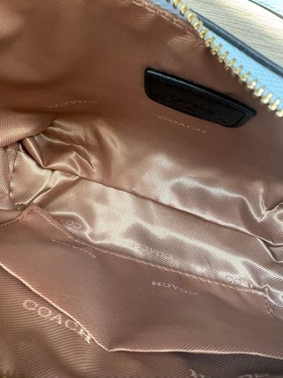 Bolso Coach azul con monedero y correa