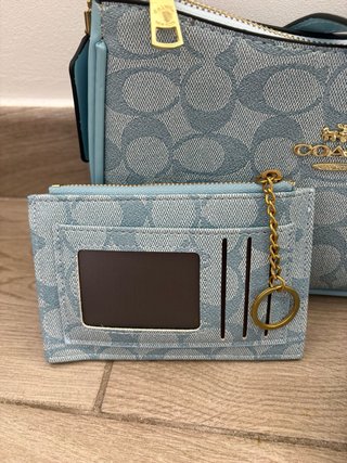 Bolso Coach azul con monedero y correa