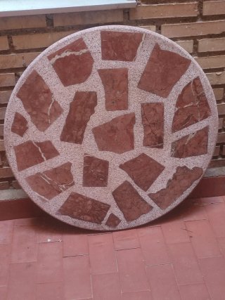 Mesa redonda de piedra mosaico jardín