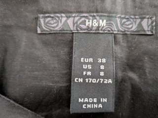 Falda H&M Negra Volante Botones