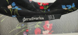 Blusa larga floral Stradivarius
