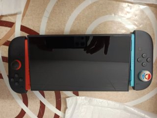 Nintendo Switch Negra con Mario kart, Mario fever,