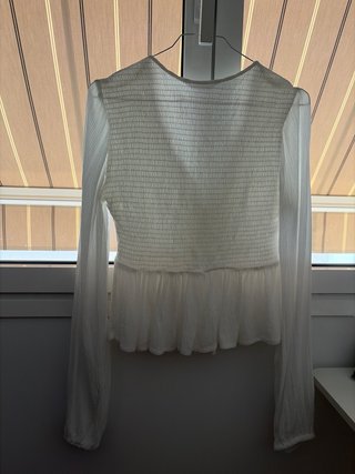 Blusa blanca elegante manga larga