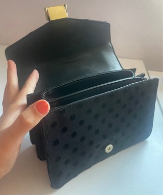 Bolso negro topos cadena dorada
