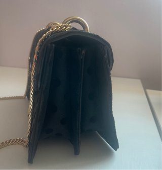 Bolso negro topos cadena dorada