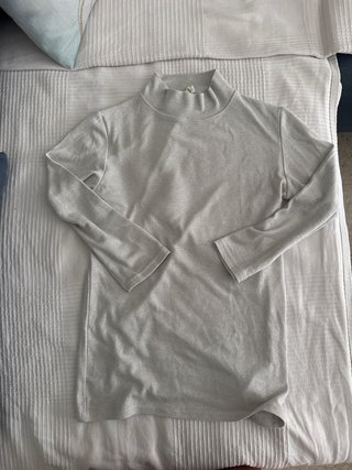 Camiseta brillante cuello alto manga larga