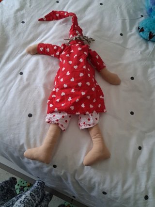 Muñeco dormilón de tela
