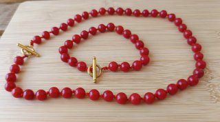 Conjunto collar y pulsera piedra roja y dorada