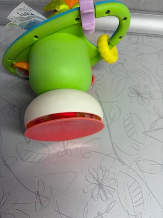 Juguete para trona Taf Toys con ventosa