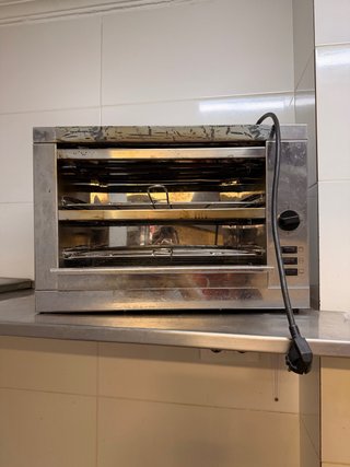 Tostador eléctrico plateado