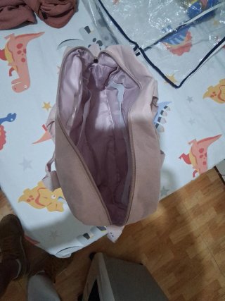 Bolso de bebé rosa con estrellas Mustela