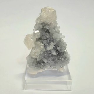 Calcita fluorescente UV sobre cuarzo cristalizado