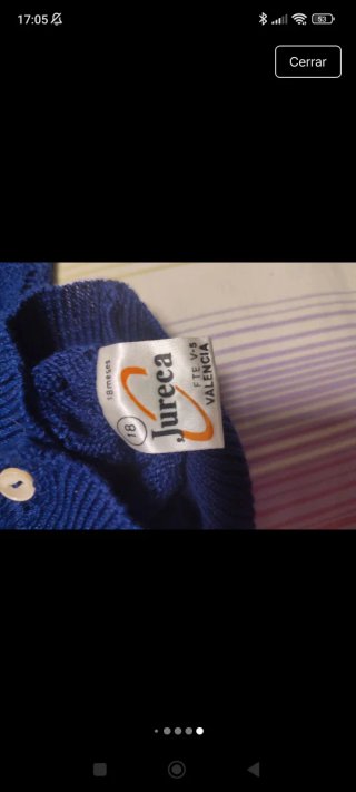 Chaqueta de punto azul para niña