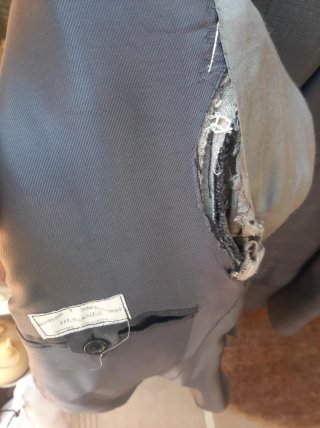 Traje de hombre gris con cuadros
