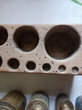 Antiguo juego de pesas de balanza