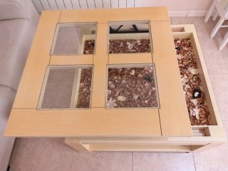 Mesa centro elevable de madera y cristal