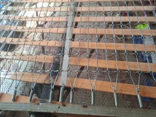 Cama antigua de madera y metal
