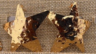 Pendientes estrella dorados