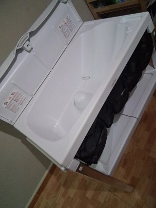 Cambiador de bebé con bañera