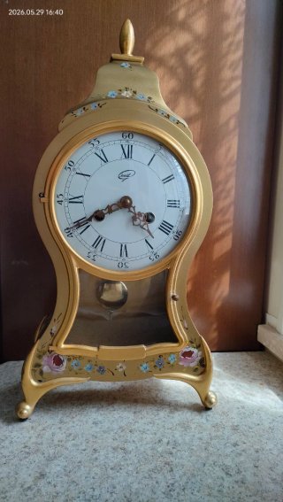 Orologio da parete dorato con fiori dipinti