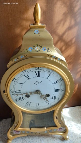 Orologio da parete dorato con fiori dipinti