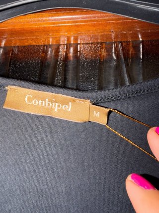 Blusa Conbipel nera con rouches