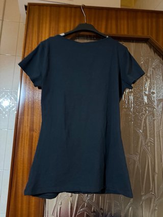 Blusa Conbipel nera con rouches