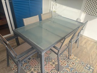 Mesa cristal 160x90cm + 6 sillas metálicas