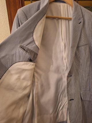 Americana mil rayas azul/blanca con coderas azules
