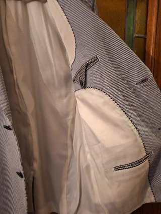 Americana mil rayas azul/blanca con coderas azules