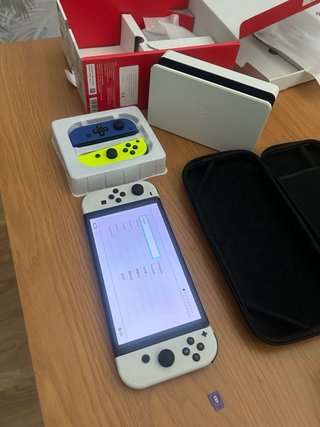Nintendo Switch OLED + extras