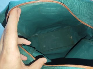 Bolso de viaje verde y marrón