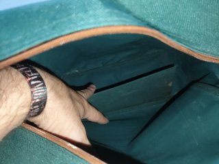Bolso de viaje verde y marrón