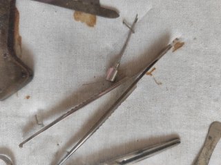 Vecchio quadro strumenti veterinaria