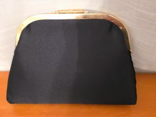 Bolso de fiesta clutch con detalle joya dorado