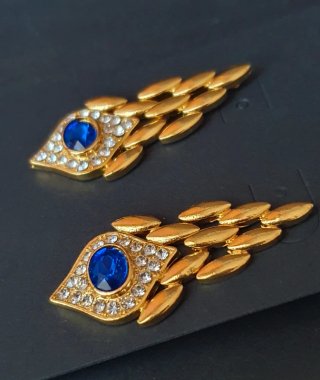 Elegantes pendientes dorados "Ojo azul protector"
