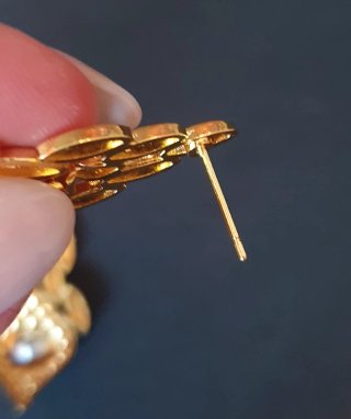Elegantes pendientes dorados "Ojo azul protector"