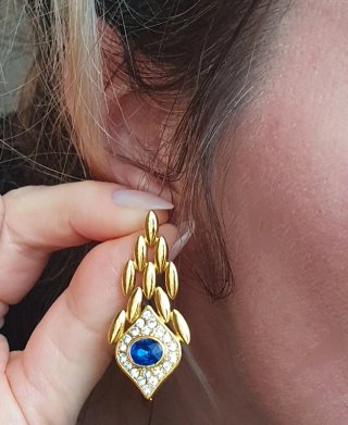 Elegantes pendientes dorados "Ojo azul protector"