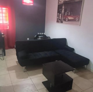 Sofá cama chaise longue y mesa centro