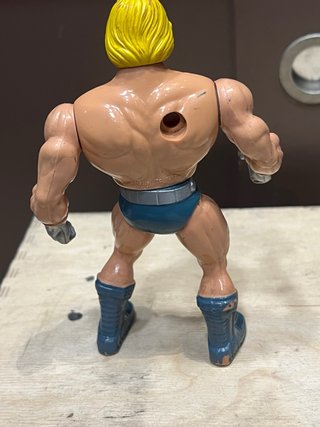 Figura He-Man Masters del Universo espada luminosa