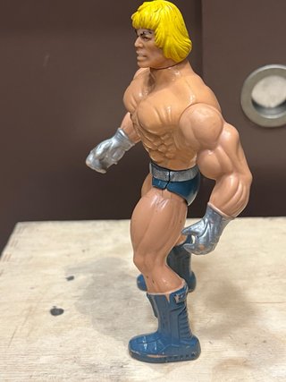 Figura He-Man Masters del Universo espada luminosa